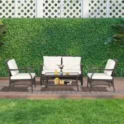 Costway 4 PCS Outdoor Rattan Conversation Set Patio Rattan Sofa Set W/ Protective Cover