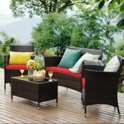 Costway 4PCS Patio Furniture Set Rattan Conversation Set W/ Tempered Glass Coffee Table Cushion Red