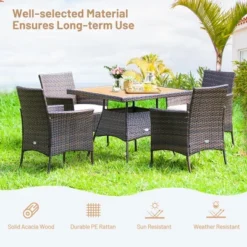 Costway 5PCS Patio Rattan Dining Furniture Set Arm Chair Wooden Table Top 13 Costway 5PCS Patio Rattan Dining Furniture Set Arm Chair Wooden Table Top -Costway GUEST b6d496b2 35d4 4825 b997 52c83b1c393d