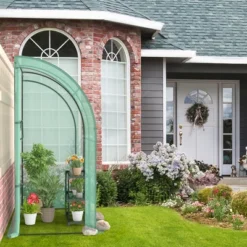 Costway 7'x 3.5'x 7' Lean-to Greenhouse Portable Wall House With Green PE Cover And Shelf -Costway GUEST b9965e16 5ad1 4126 b726 c21b4e356bb4